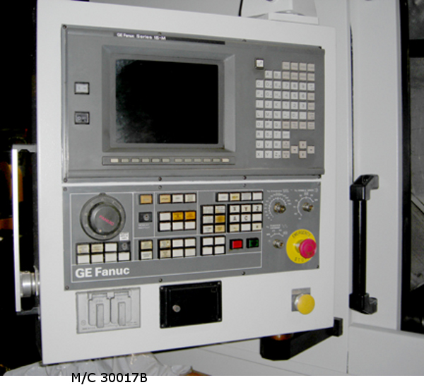 Photo 2 -  4� (100mm) Diameter, 4� (100mm) face, 8.6 DP (3 MOD), FANUC 15-M Control, 32 Position Automatic Loader, Hob Shift, Tangential, Differential, Infeed,  Chip Conveyor, 1997  (30017)
            This machine has seen very little use. It was originally sold and shipped to a company making a part for General Electric washing machines, but before it was delivered, the washing machine was redesigned to use a variable-speed A.C. motor. This machine only ran a few parts for acceptance and was not used since.
